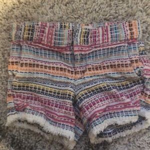 Colorful tasseled shorts.